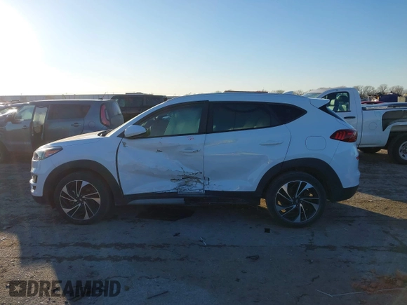 2019 Hyundai Tucson Sport with VIN KM8J33AL1KU838499, listed as a IAAI auction lot 41317832 with 71,594 mi miles. Bid and sale history available at carsss.com. Image 14.