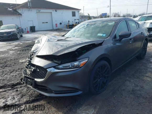 2020 Mazda 6 Grand Touring with VIN JM1GL1TY0L1521859, listed as a IAAI auction lot 41634368 with 36,709 mi miles and . Bid and sale history available at DreamBid. Image 17.