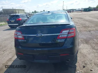 2014 Ford Taurus Limited z VIN 1FAHP2F85EG125118, wystawiony jako IAAI lot #42457437 z przebiegiem 129 406 mil mil oraz . Historia ofert i sprzedaży dostępna na DreamBid. Obrazek 16.