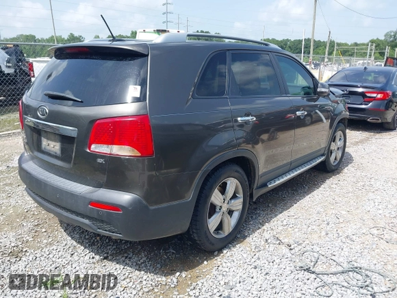 2012 Kia Sorento EX with VIN 5XYKU4A69CG276943, listed as a IAAI auction lot 42604286 with 182,425 mi miles and . Bid and sale history available at DreamBid. Image 4.
