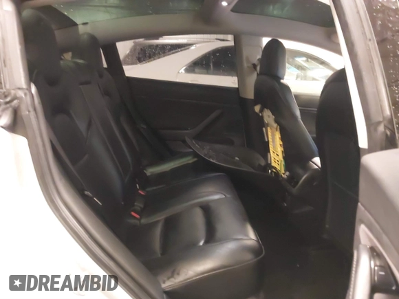 2018 Tesla Model 3 Long Range Battery with VIN 5YJ3E1EA8JF154738, listed as a IAAI auction lot 41013807 with 115,488 mi miles and . Bid and sale history available at DreamBid. Image 8.