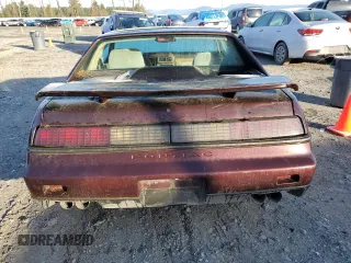 1986 Pontiac Fiero z VIN 1G2PF3793GP210763, wystawiony jako Copart lot #41891075 z przebiegiem 144 219 mil mil oraz Czysty tytuł • Clean title. Historia ofert i sprzedaży dostępna na DreamBid. Obrazek 6.