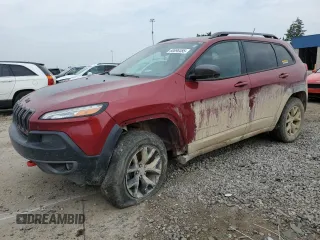 2015 Jeep Cherokee Trailhawk z VIN 1C4PJMBS8FW660035, wystawiony jako Copart lot #60696485 z przebiegiem 189 857 mil mil oraz Czysty tytuł • Clean title. Historia ofert i sprzedaży dostępna na DreamBid. Obrazek 1.