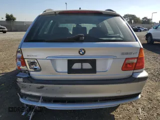 2004 BMW 3 Series 325xi with VIN WBAEP334X4PF04053, listed as a Copart auction lot 84766134 with 260,954 mi miles and Salvage Title. Bid and sale history available at carsss.com. Image 6.