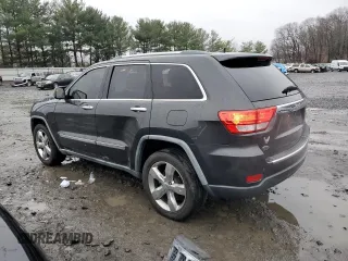 2011 Jeep Grand Cherokee Overland with VIN 1J4RS6GG5BC588562, listed as a Copart auction lot 84805424 with 150,030 mi miles and Salvage Title. Bid and sale history available at DreamBid. Image 2.
