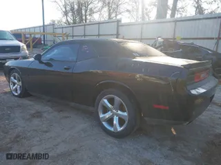 2014 Dodge Challenger SXT with VIN 2C3CDYAG6EH187148, listed as a IAAI auction lot 41272492 with 168,225 mi miles. Bid and sale history available at carsss.com. Image 3.