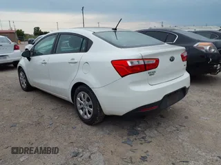 2014 Kia Rio LX with VIN KNADM4A3XE6384733, listed as a IAAI auction lot 42196921 with 153,084 mi miles and . Bid and sale history available at DreamBid. Image 3.