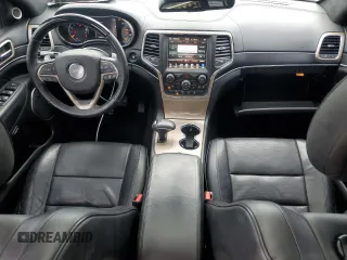 2015 Jeep Grand Cherokee Summit with VIN 1C4RJFJM7FC928257, listed as a Copart auction lot 82525714 with 148,208 mi miles and Salvage Title. Bid and sale history available at carsss.com. Image 8.
