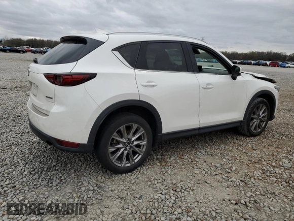 2021 Mazda CX-5 Grand Touring with VIN JM3KFBDM2M1436789, listed as a Copart auction lot 49534305 with 65,790 mi miles and Salvage Title. Bid and sale history available at carsss.com. Image 3.