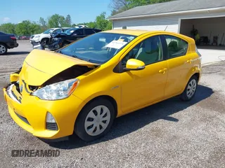 2014 Toyota Prius One z VIN JTDKDTB31E1066984, wystawiony jako IAAI lot #42261574 z przebiegiem 163 378 mil mil oraz . Historia ofert i sprzedaży dostępna na DreamBid. Obrazek 19.