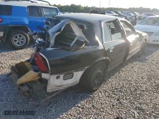 2004 Ford Police Interceptor Base w/3.27 Axle with VIN 2FAFP71WX4X149014, listed as a Copart auction lot 71305734 with 180,542 mi miles and Salvage Title. Bid and sale history available at carsss.com. Image 3.