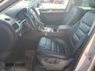 2014 Volkswagen Touareg Lux with VIN WVGEF9BP1ED012267, listed as a Copart auction lot 58924055 with 81,009 mi miles and Salvage title. Bid and sale history available at DreamBid. Image 7.