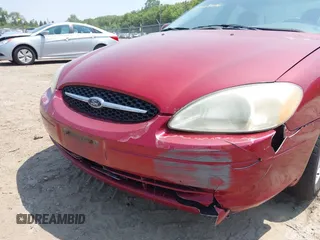 2003 Ford Taurus SE Standard with VIN 1FAFP53UX3G124702, listed as a IAAI auction lot 42463606 with 129,874 mi miles and . Bid and sale history available at DreamBid. Image 6.