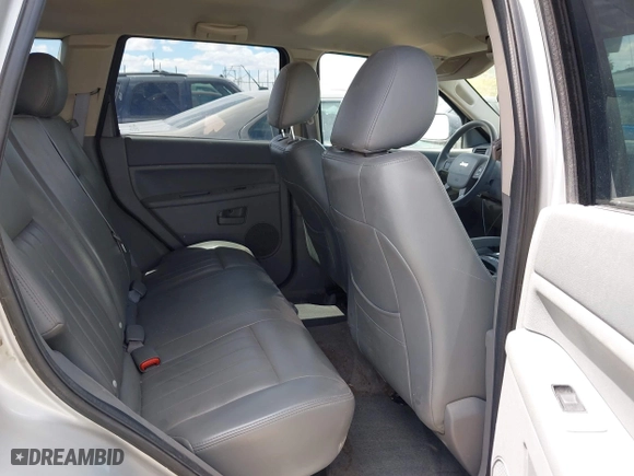 2005 Jeep Grand Cherokee Laredo with VIN 1J4GR48K15C542354, listed as a IAAI auction lot 41940355 with 158,065 mi miles. Bid and sale history available at carsss.com. Image 8.