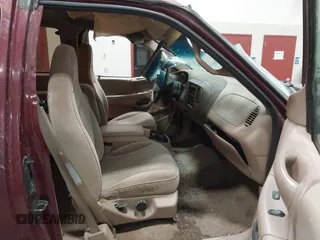 1997 Ford F-150 XL with VIN 1FTEX18L3VKC91921, listed as a IAAI auction lot 41820453 with 210,553 mi miles. Bid and sale history available at carsss.com. Image 5.