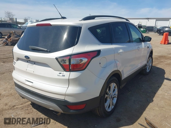2018 Ford Escape SE z VIN 1FMCU9GD4JUB06181, wystawiony jako IAAI lot #42046708 z przebiegiem 160 987 mil mil oraz . Historia ofert i sprzedaży dostępna na DreamBid. Obrazek 4.