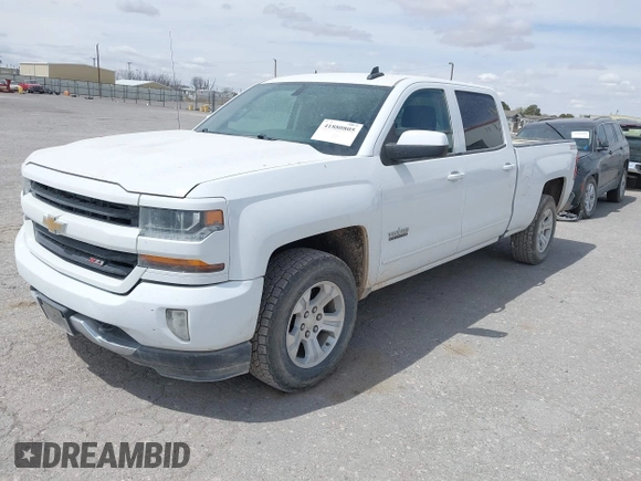 2018 Chevrolet Silverado 1500 LT with VIN 1GCUKREC5JF133998, listed as a IAAI auction lot 41880805 with 166,258 mi miles and . Bid and sale history available at DreamBid. Image 17.