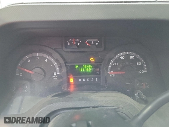 2013 Ford Econoline Cargo Commercial with VIN 1FTNE1EW6DDB01438, listed as a IAAI auction lot 42737683 with 125,160 mi miles and . Bid and sale history available at DreamBid. Image 11.