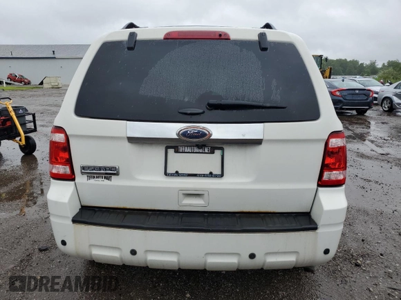 2011 Ford Escape Limited z VIN 1FMCU0E72BKA80668, wystawiony jako Copart lot #61273515 z przebiegiem 120 988 mil mil oraz Czysty tytuł • Clean title. Historia ofert i sprzedaży dostępna na DreamBid. Obrazek 6.