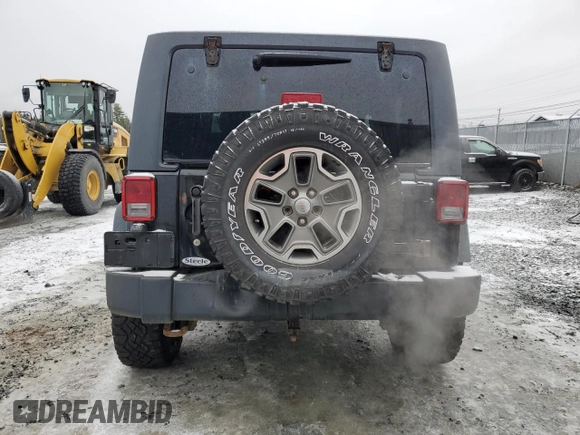 2013 Jeep Wrangler Rubicon 10th Anniversary with VIN 1C4BJWCG6DL507667, listed as a Copart auction lot 84139134 with 264,970 mi miles and Salvage Title. Bid and sale history available at DreamBid. Image 6.