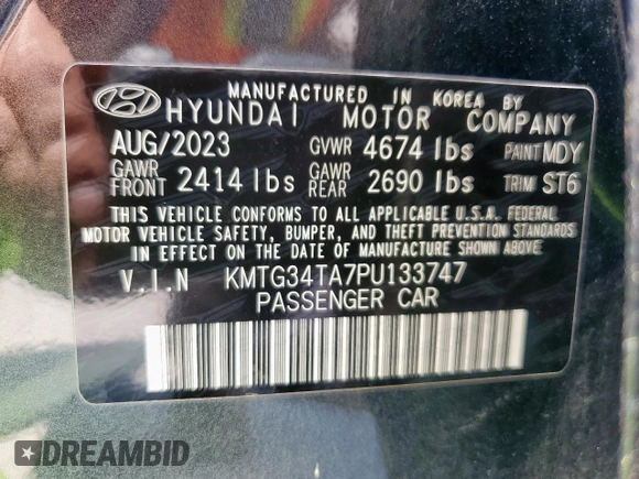 2023 Genesis G70 2.0T with VIN KMTG34TA7PU133747, listed as a Copart auction lot 56338345 with 27,190 mi miles and Salvage title. Bid and sale history available at DreamBid. Image 12.