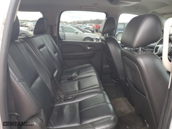 2013 Chevrolet Suburban LT with VIN 1GNSCJE02DR202622, listed as a Copart auction lot 87671395 with 159,146 mi miles and Salvage Title. Bid and sale history available at carsss.com. Image 12.