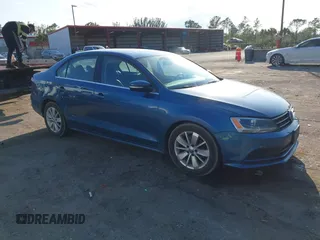 2016 Volkswagen Jetta Sedan 1.4T SE with VIN 3VWD67AJ0GM328412, listed as a IAAI auction lot 41556254 with 137,814 mi miles. Bid and sale history available at carsss.com. Image 1.