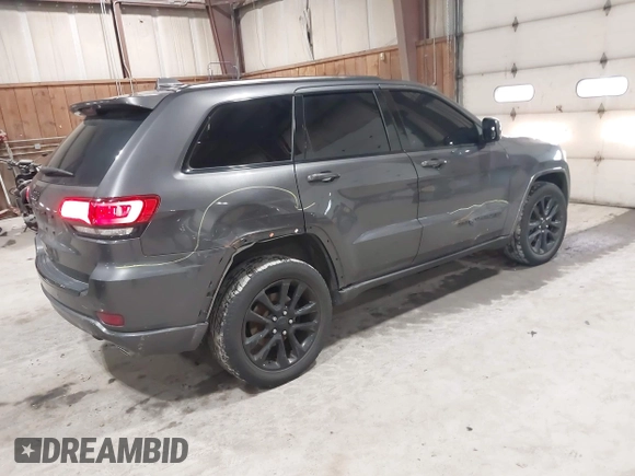 2017 Jeep Grand Cherokee Laredo with VIN 1C4RJFAG8HC910038, listed as a IAAI auction lot 41928179 with 76,862 mi miles. Bid and sale history available at carsss.com. Image 4.