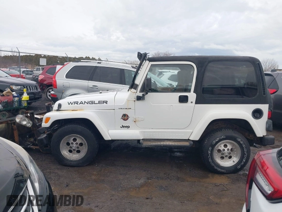 1997 Jeep Wrangler Sahara with VIN 1J4FY49S1VP503639, listed as a IAAI auction lot 41708134 with 102,196 mi miles and . Bid and sale history available at carsss.com. Image 15.