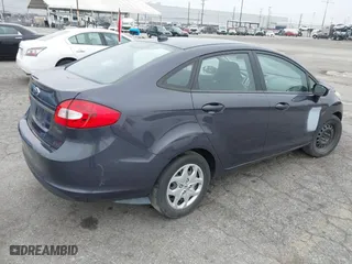 2013 Ford Fiesta SE with VIN 3FADP4BJ0DM199277, listed as a IAAI auction lot 42047833 with 142,739 mi miles. Bid and sale history available at carsss.com. Image 4.