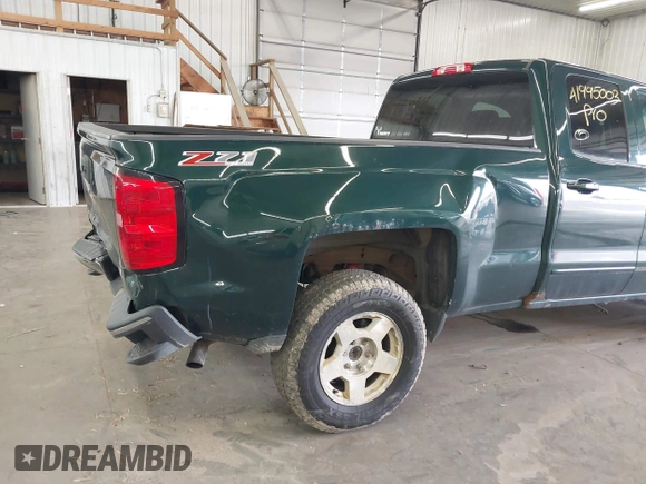 2015 Chevrolet Silverado 1500 LT with VIN 1GCVKREC2FZ147321, listed as a IAAI auction lot 41995003 with 148,053 mi miles and . Bid and sale history available at DreamBid. Image 19.