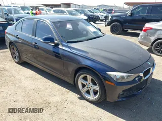 2015 BMW 3 Series 320i with VIN WBA3B1C53FK138310, listed as a IAAI auction lot 41677208 with 57,891 mi miles. Bid and sale history available at carsss.com. Image 1.