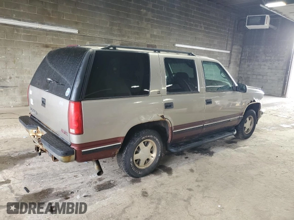 1998 GMC Yukon with VIN 1GKEC13R9WJ715363, listed as a Copart auction lot 81483814 with 186,437 mi miles and Salvage Title. Bid and sale history available at carsss.com. Image 3.