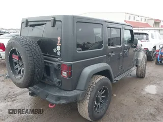 2018 Jeep Wrangler Unlimited Rubicon Recon with VIN 1C4BJWFG4JL827920, listed as a IAAI auction lot 41368319 with 110,835 mi miles and . Bid and sale history available at DreamBid. Image 4.