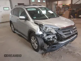 2012 Honda CR-V EX-L with VIN 2HKRM4H71CH600957, listed as a IAAI auction lot 42724693 with 73,908 mi miles and . Bid and sale history available at DreamBid. Image 1.