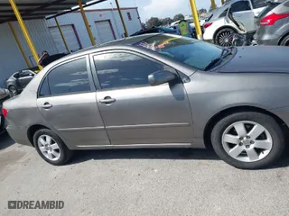 2004 Toyota Corolla CE with VIN 1NXBR38E84Z331547, listed as a IAAI auction lot 41963632 with 202,984 mi miles. Bid and sale history available at carsss.com. Image 13.
