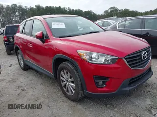 2016 Mazda CX-5 Touring z VIN JM3KE2CY3G0894441, wystawiony jako IAAI lot #41508767 z przebiegiem 88 554 mil mil oraz . Historia ofert i sprzedaży dostępna na DreamBid. Obrazek 1.