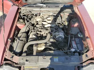 2002 Ford Mustang Deluxe с VIN 1FAFP44422F163443, выставлен на аукционе Copart как лот 57532435 с пробегом 209 356 миль миль и Списание • Salvage title. История ставок и продаж доступна на DreamBid. Изображение 11.