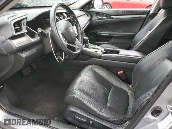 2017 Honda Civic EX-L z VIN 19XFC1F74HE209787, wystawiony jako Copart lot #56352415 z przebiegiem 130 264 mil mil oraz Szkoda całkowita • Salvage title. Historia ofert i sprzedaży dostępna na DreamBid. Obrazek 7.