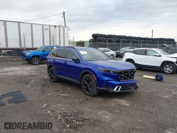 2025 Honda CR-V Sport Touring with VIN 2HKRS6H99SH807839, listed as a IAAI auction lot 42029547 with 5,979 mi miles and . Bid and sale history available at DreamBid. Image 1.