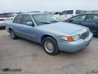 2001 Mercury Grand Marquis LS with VIN 2MEFM75W71X689024, listed as a IAAI auction lot 41876599 with 192,590 mi miles. Bid and sale history available at carsss.com. Image 1.