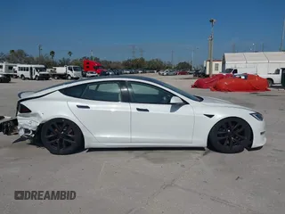 2022 Tesla Model S Plaid with VIN 5YJSA1E64NF484904, listed as a IAAI auction lot 41594464 with 25,299 mi miles and . Bid and sale history available at DreamBid. Image 12.