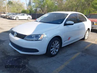 2012 Volkswagen Jetta Sedan SE w/Convenience & Sunroof with VIN 3VWDX7AJ4CM386885, listed as a IAAI auction lot 42052411 with 328,232 mi miles. Bid and sale history available at carsss.com. Image 2.