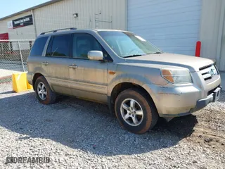 2007 Honda Pilot EX-L with VIN 5FNYF285X7B000189, listed as a IAAI auction lot 42026059 with 330,723 mi miles. Bid and sale history available at carsss.com. Image 1.
