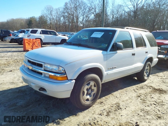 2002 Chevrolet Blazer LS z VIN 1GNDT13W32K146843, wystawiony jako IAAI lot #41497892 z przebiegiem 121 882 mil mil oraz . Historia ofert i sprzedaży dostępna na DreamBid. Obrazek 2.