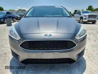 2018 Ford Focus SE with VIN 1FADP3F25JL331038, listed as a Copart auction lot 60235395 with 37,038 mi miles and Salvage title. Bid and sale history available at DreamBid. Image 5.