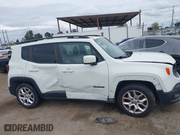 2015 Jeep Renegade Latitude with VIN ZACCJABT0FPB65587, listed as a IAAI auction lot 41913717 with 116,830 mi miles. Bid and sale history available at carsss.com. Image 13.