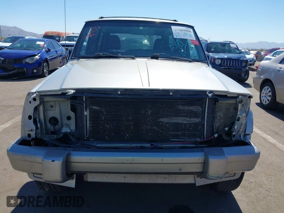 2000 Jeep Cherokee Classic with VIN 1J4FF58S5YL260331, listed as a IAAI auction lot 41584008 with 224,100 mi miles. Bid and sale history available at carsss.com. Image 6.