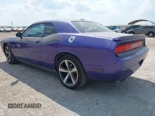 2014 Dodge Challenger R/T z VIN 2C3CDYBT0EH143576, wystawiony jako IAAI lot #42333984 z przebiegiem 189 874 mil mil oraz . Historia ofert i sprzedaży dostępna na DreamBid. Obrazek 3.