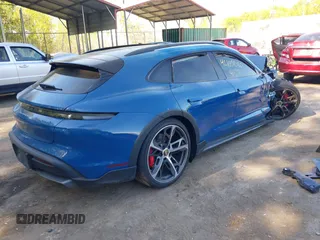 2023 Porsche Taycan 4S z VIN WP0BB2Y19PSA65443, wystawiony jako IAAI lot #42105240 z przebiegiem 265 mil mil oraz . Historia ofert i sprzedaży dostępna na DreamBid. Obrazek 4.